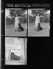 Unidentified women with dog; Unidentified woman (3 Negatives (October 4, 1954) [Sleeve 9, Folder b, Box 5]
